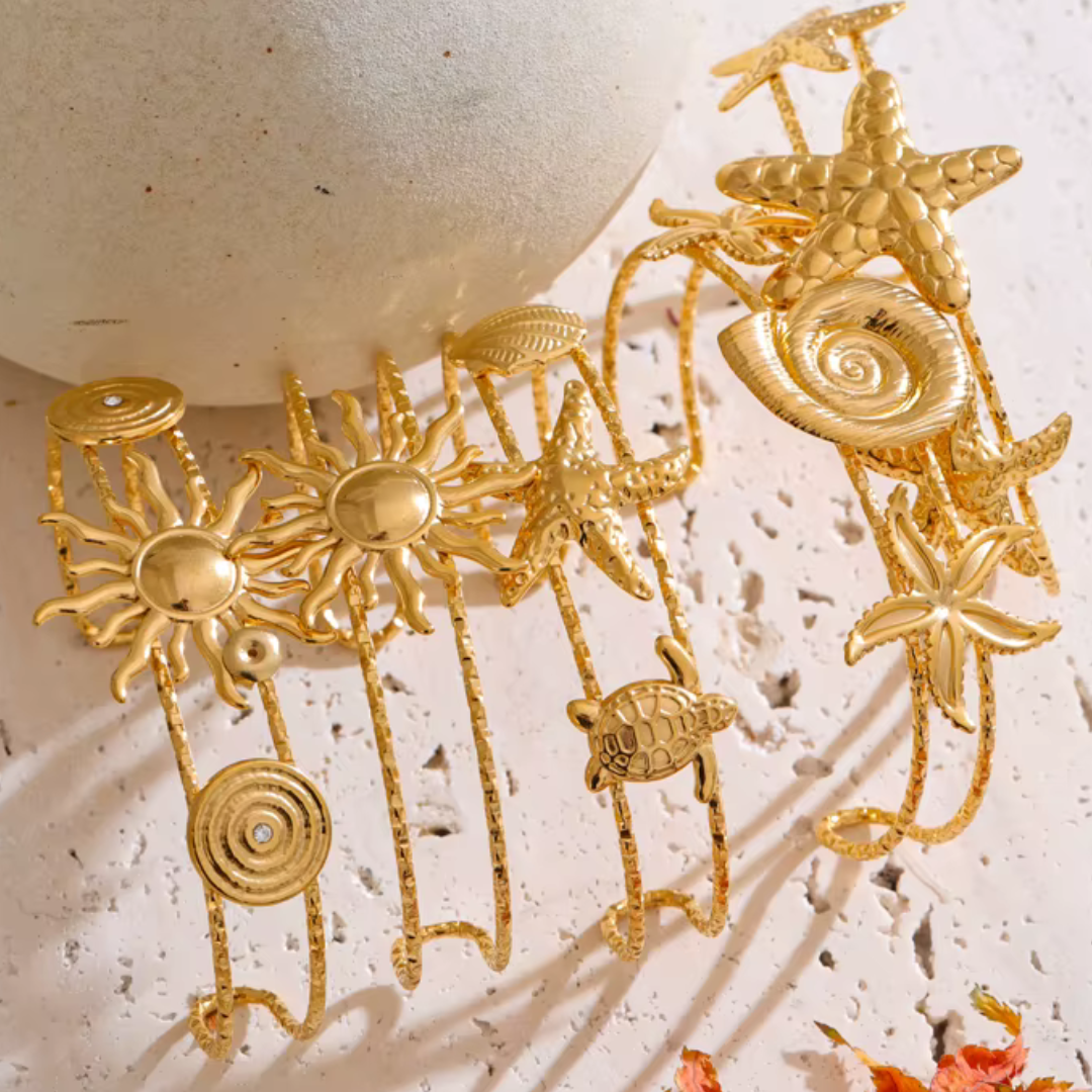 Pulseras de oro del océano (varias)