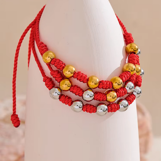 Red rope bracelet with 7 knots and steel beads, waterproof unisex design